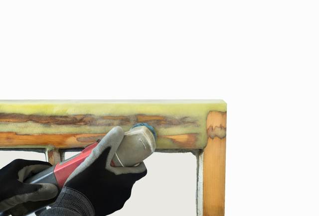 Cutting the paint seal to free a painted-shut sash window